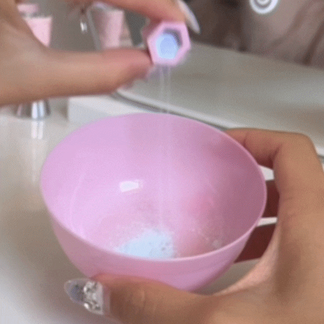 CheekyGlo Ice Slushy Soothing Face Mask being applied all over the face to cool, soothe, de-puff, and refresh dull, tired skin.