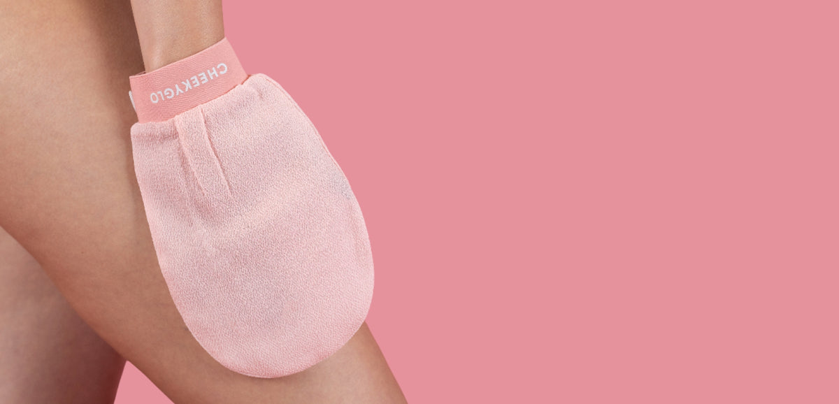 Pink exfoliating glove