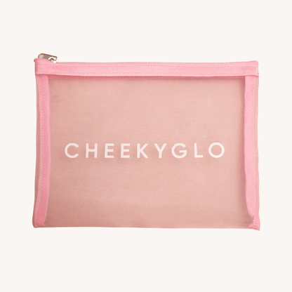 A pink mesh zippered makeup bag from CheekyGlo, featuring &quot;CHEEKYGLO&quot; in white across the front.