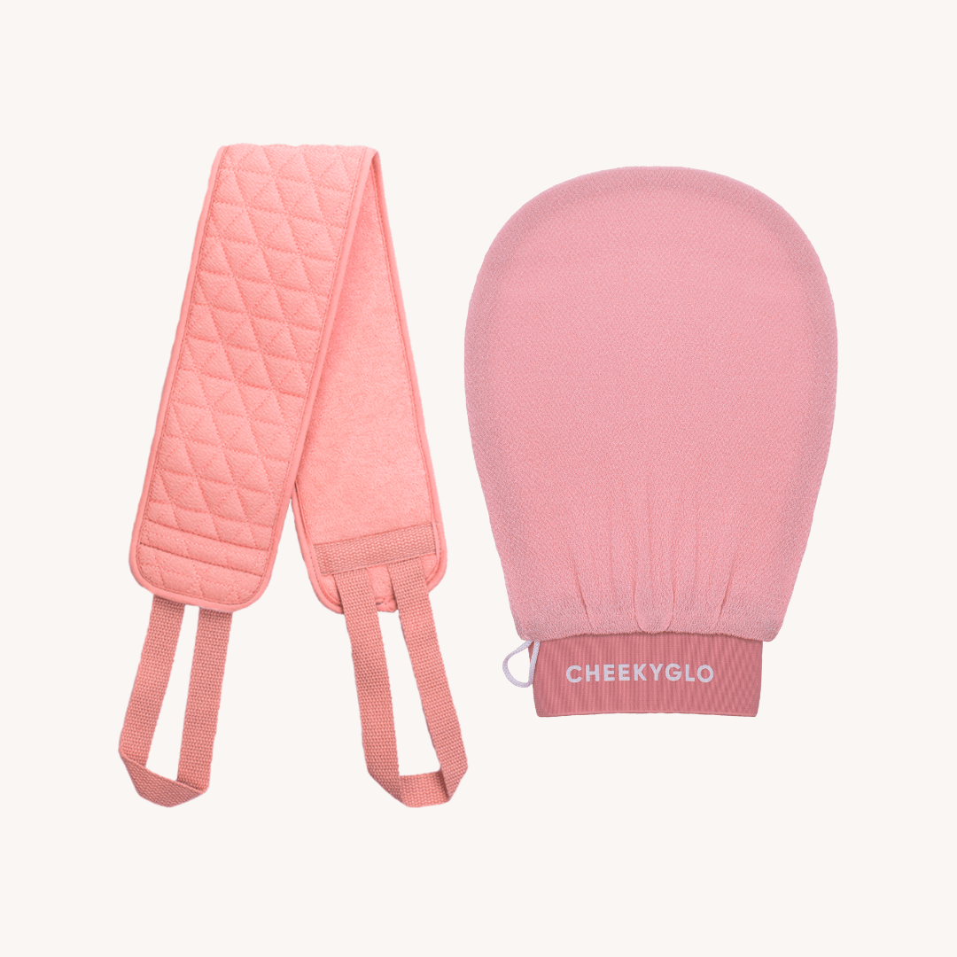 The Exfoliating Body Duo from CheekyGlo offers a pink exfoliating bath set that includes a body glove and a strap with handles, perfect for comprehensive cleansing. Crafted from biodegradable viscose, the mitt showcases the &quot;CHEEKYGLO&quot; branding, merging eco-friendly elements with fashionable design.