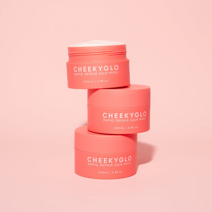 Three pink containers of CheekyGlo&